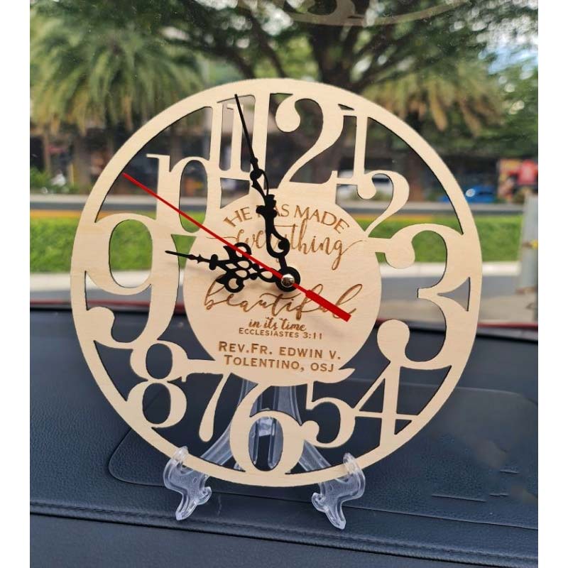 Wooden wall clock made of basswood, engraved with wedding designs, perfect for wedding souvenirs.