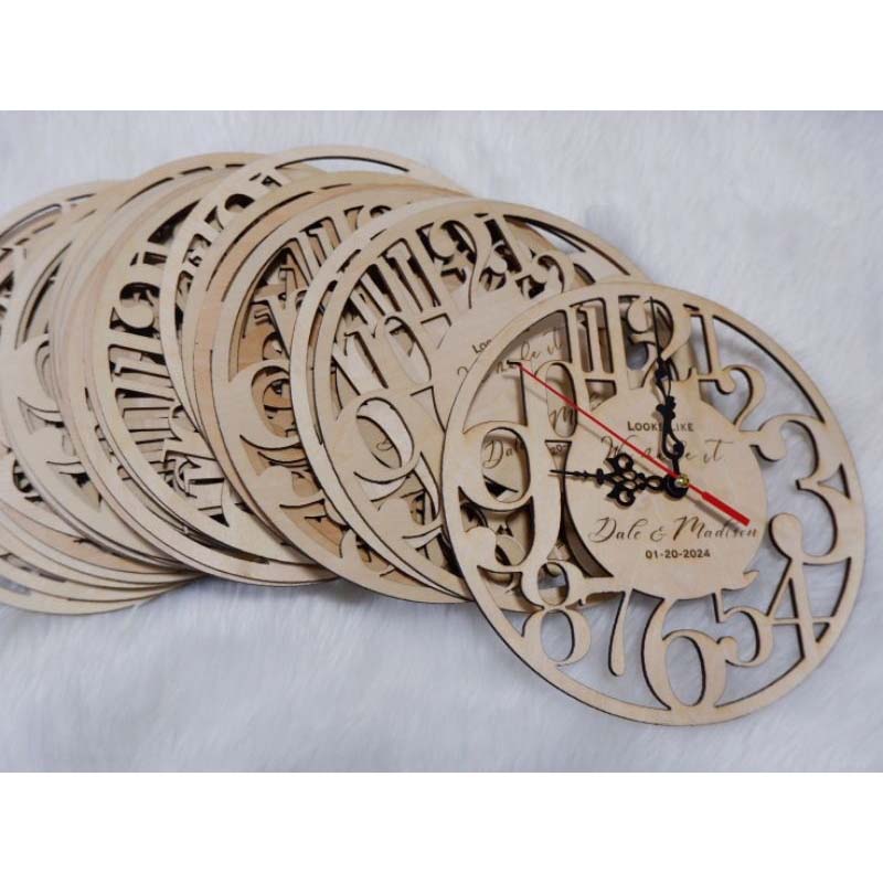 Wooden wall clock made of basswood, engraved with wedding designs, perfect for wedding souvenirs.